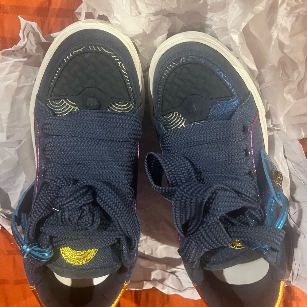 NWOT. Kurt Geiger Women Sneakers in Blue with Yellow and Orange Accents.